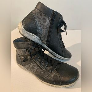 Remote black leather high top sneakers or boots